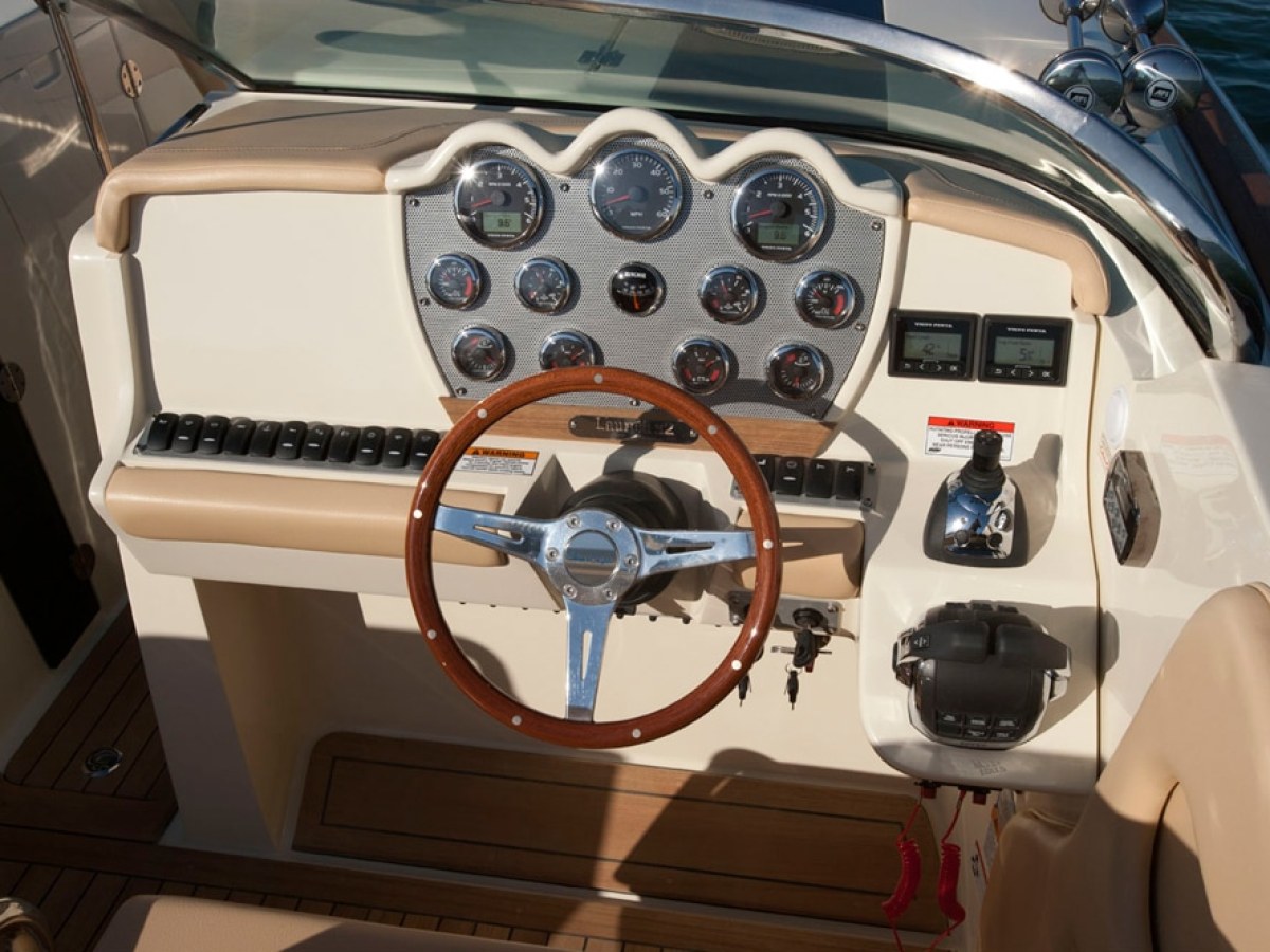 a stove top oven sitting inside of a car