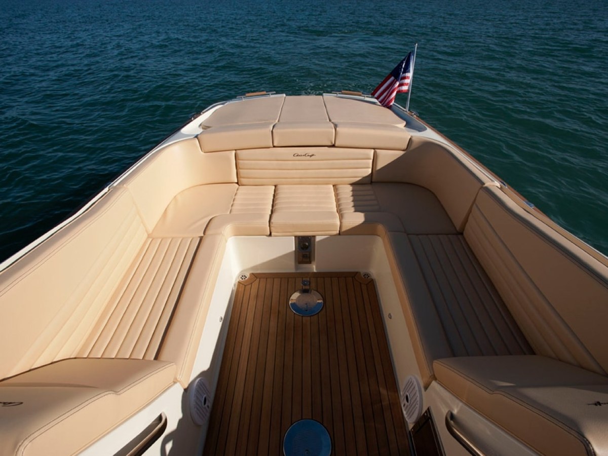 a wooden boat in a body of water